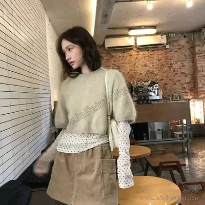77007