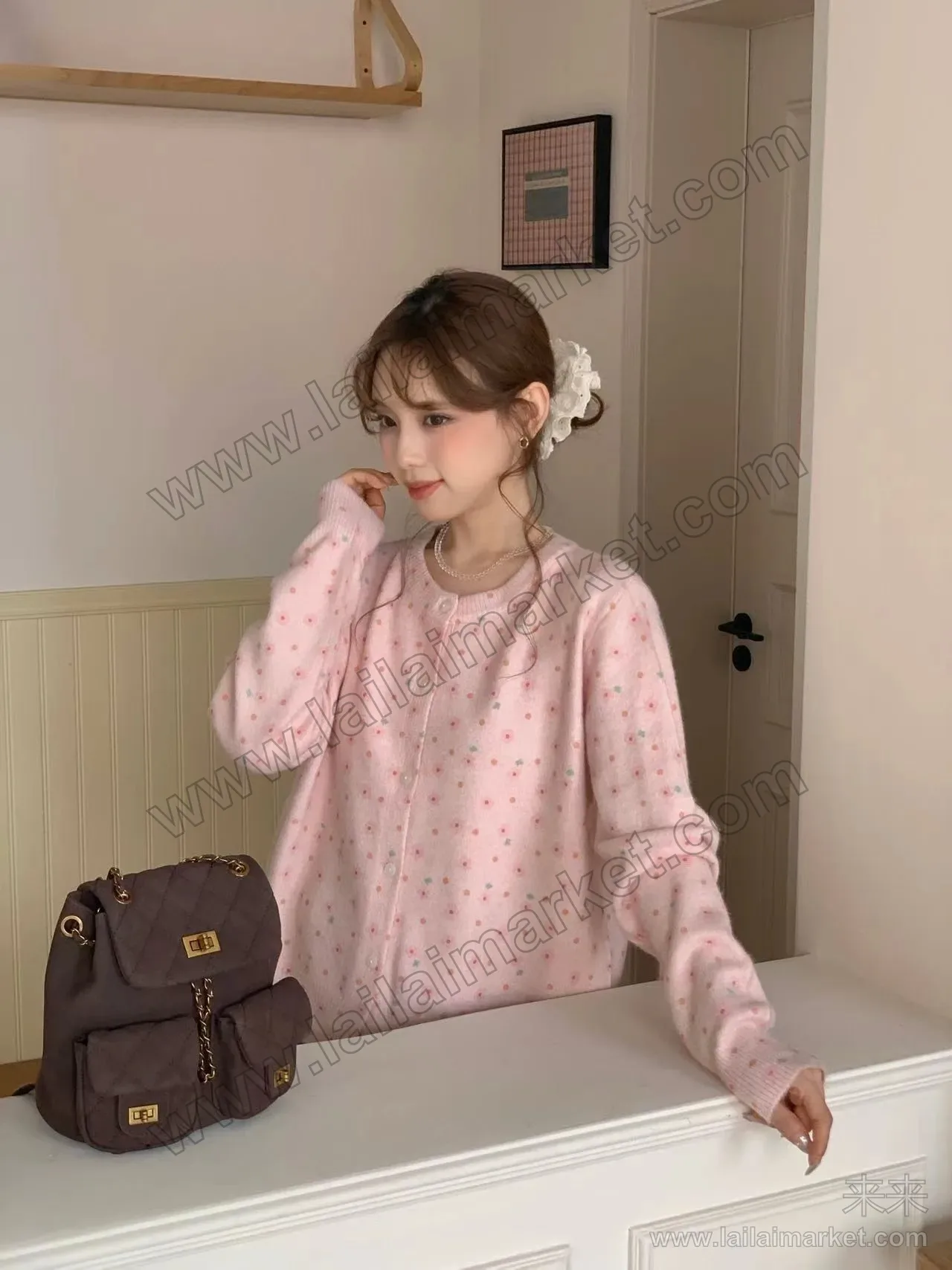 26076
